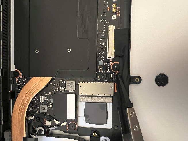 Screenshot of tweezers disconnecting left speaker connector.