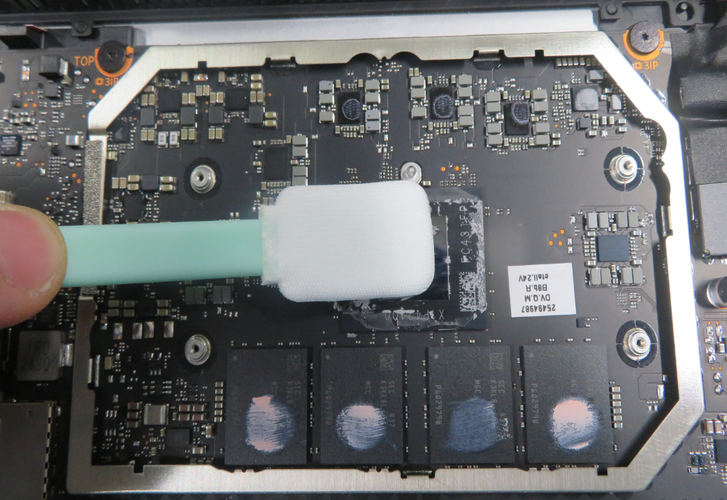 Screenshot of using a cotton swab to clean remaining adhesive.