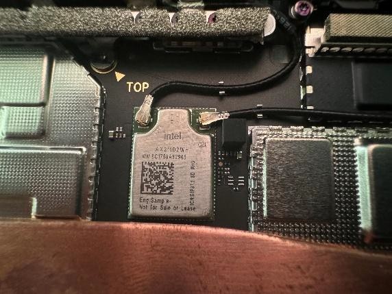 Screenshot that shows Wi-Fi antenna cable routed above RF lids and onto module.