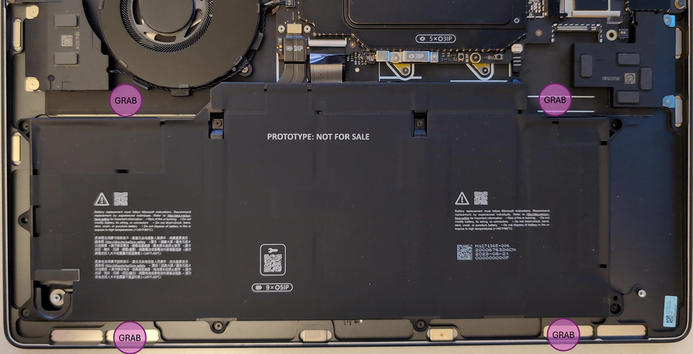 Screenshot that shows lifting the battery out of the chassis by the identified grab points onto an ESD-safe mat.