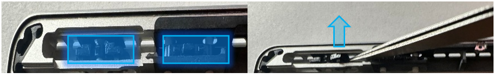 Screenshot that shows retention clips being levered up with spudger for removal