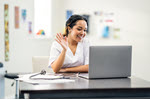 Photograph showing collaboration through a health phone call.