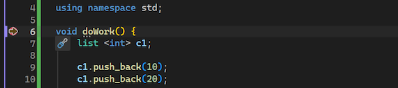 Screenshot che mostra il debugger sospeso in un punto di interruzione impostato in Visual Studio.