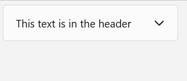 最初に展開され、次に折りたたまれるエキスパンダー。ヘッダーには「This text is in the header」というテキストが表示され、コンテンツには「This is in the content」というテキストが表示されています。
